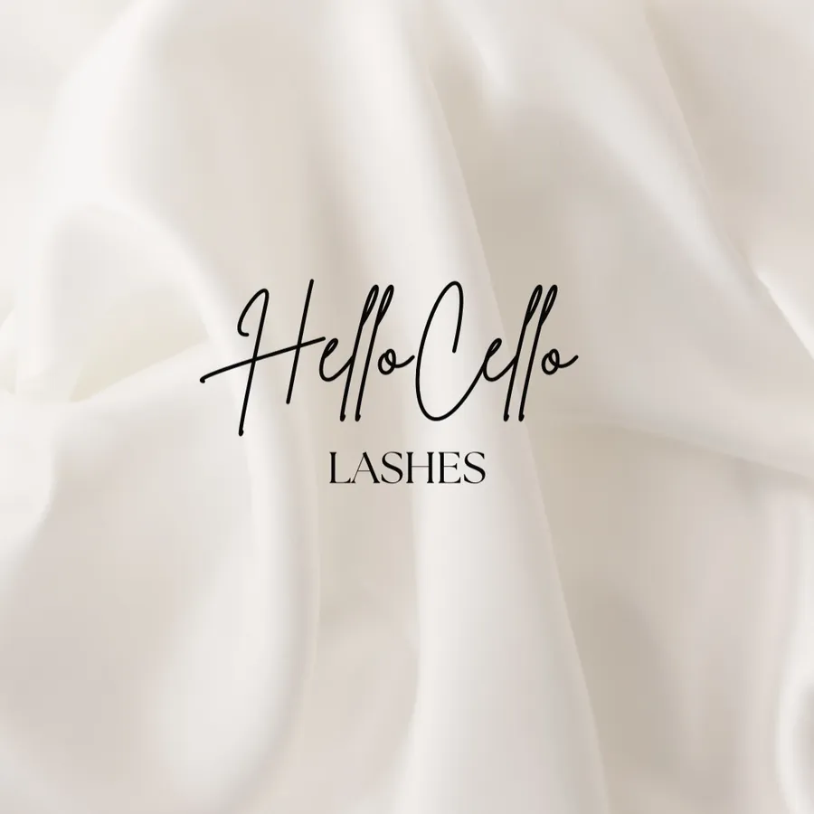 The HelloCello Lashes logo on white silk